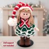 Handmade crochet Christmas elf girl doll in red and green – soft amigurumi holiday decoration and Christmas gift.